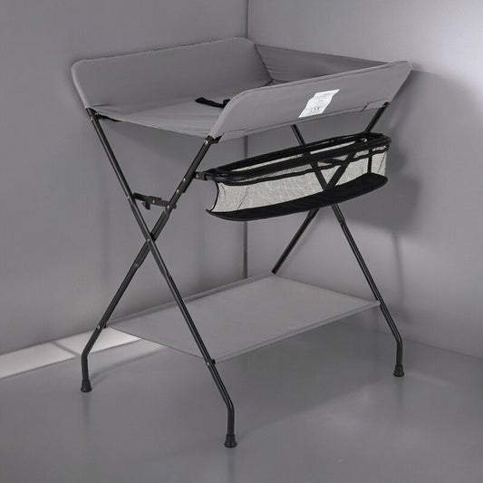 Masuta pentru infasat si schimbat scutece, Feedo, Multifunctionala, Pliabila, Cu raft pentru depozitare si compartiment lateral, Realizata din fier, panza si in, 80.5 x 67 x 102.5 cm, Gri