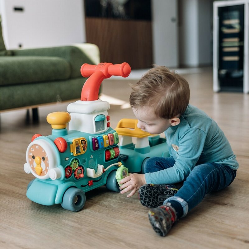 Antemergator 5 in 1 Magic Train, Free2Move, Cu diverse activitati de joaca, Panou Educational, Efecte sonore si luminoase, Green