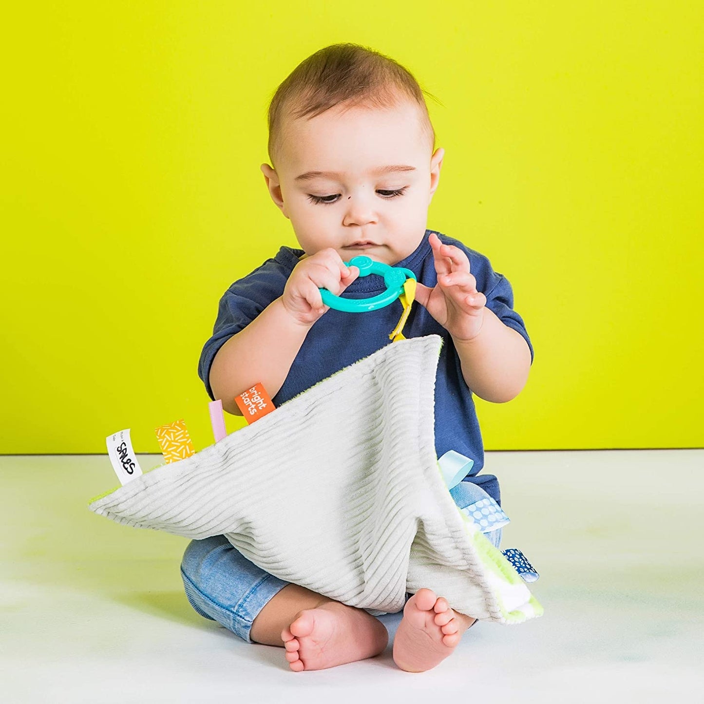 Bright Starts - Paturica vesela Little Taggies cu buline verzi