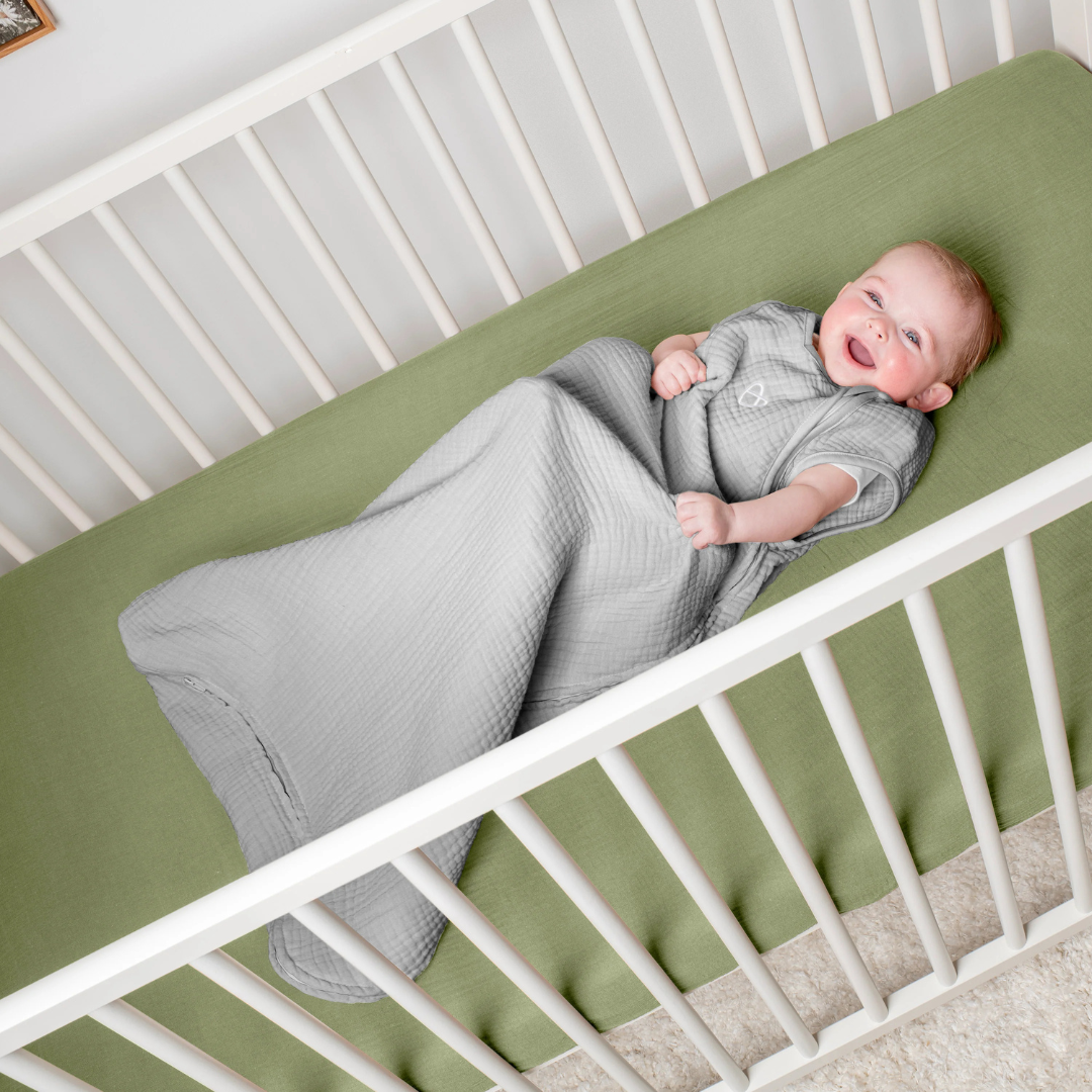 Ingenuity - Sac de dormit Swaddle Me Night Sack Sleeper, 3-18 luni, Sunset Space