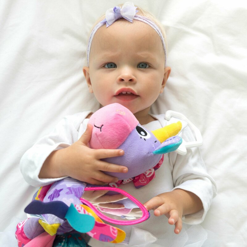 Jucarie pentru carucior, scoica auto si patut, Playgro, Cu jucarie de dentitie, Cu sunete, Activity Friend Stella Unicorn, 39 cm