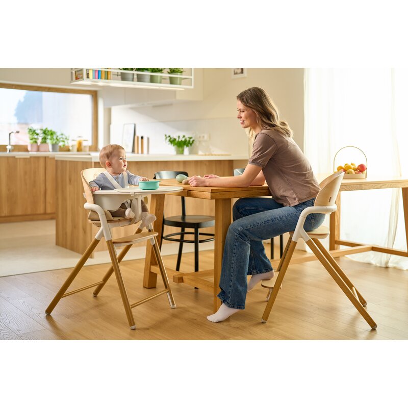 Scaun de masa multifunctional Celia, Lionelo, Din lemn de fag, 6 luni- adult, Reglabil pe inaltime, Husa impermeabila, Tavita silicon, Suport de picioare reglabil, Greutate maxima 90 Kg, Negru