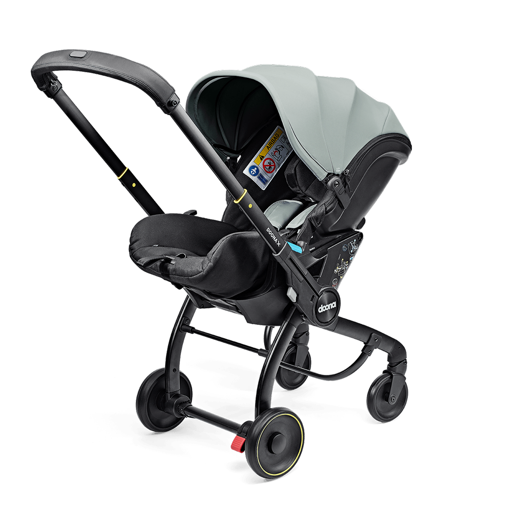 Scoică Auto Cărucior Doona X i-Size Dusty Sage 2 în 1 - Transformare Rapidă