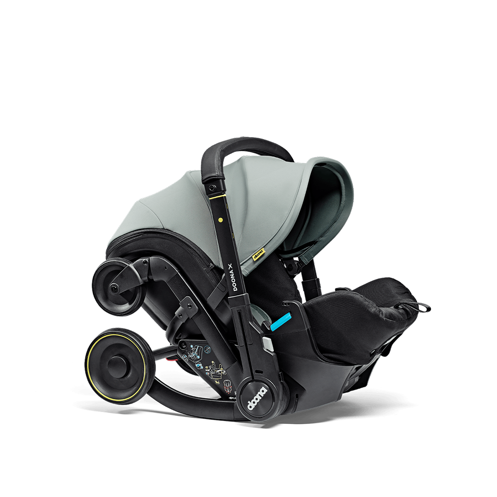 Scoică Auto Cărucior Doona X i-Size Dusty Sage 2 în 1 - Transformare Rapidă