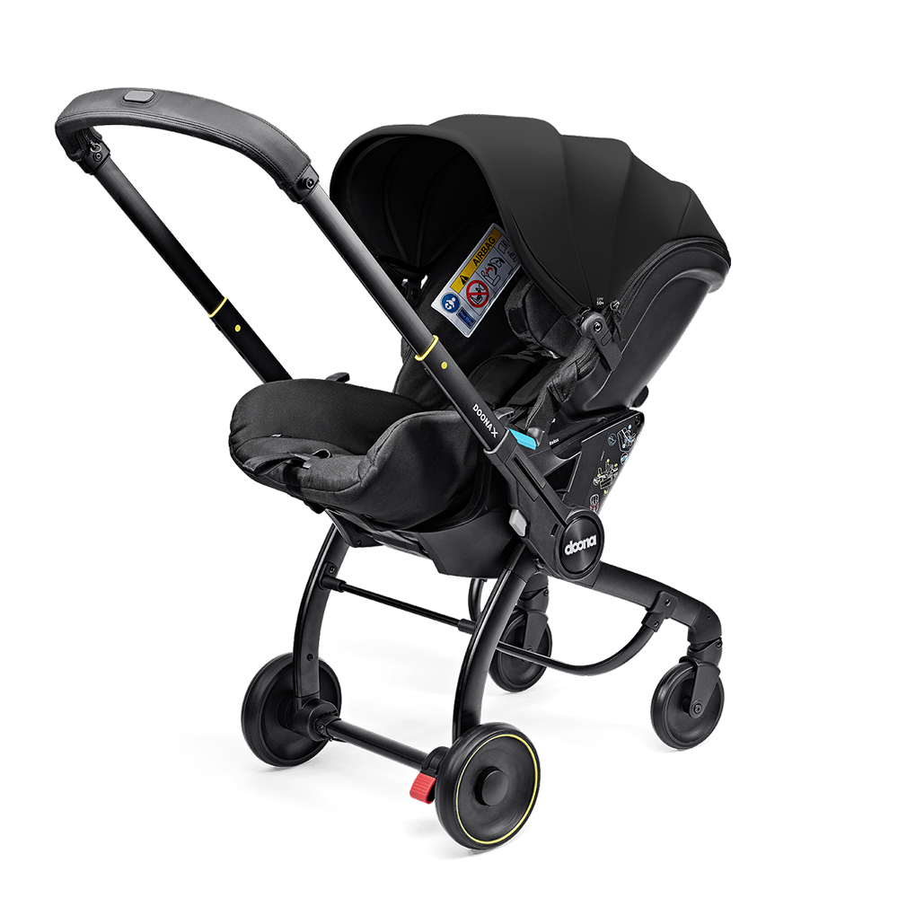 Scoică Auto Cărucior Doona X i-Size Nitro Black 2 în 1 - Transformare Rapidă
