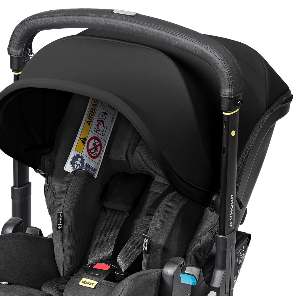 Scoică Auto Cărucior Doona X i-Size Nitro Black 2 în 1 - Transformare Rapidă